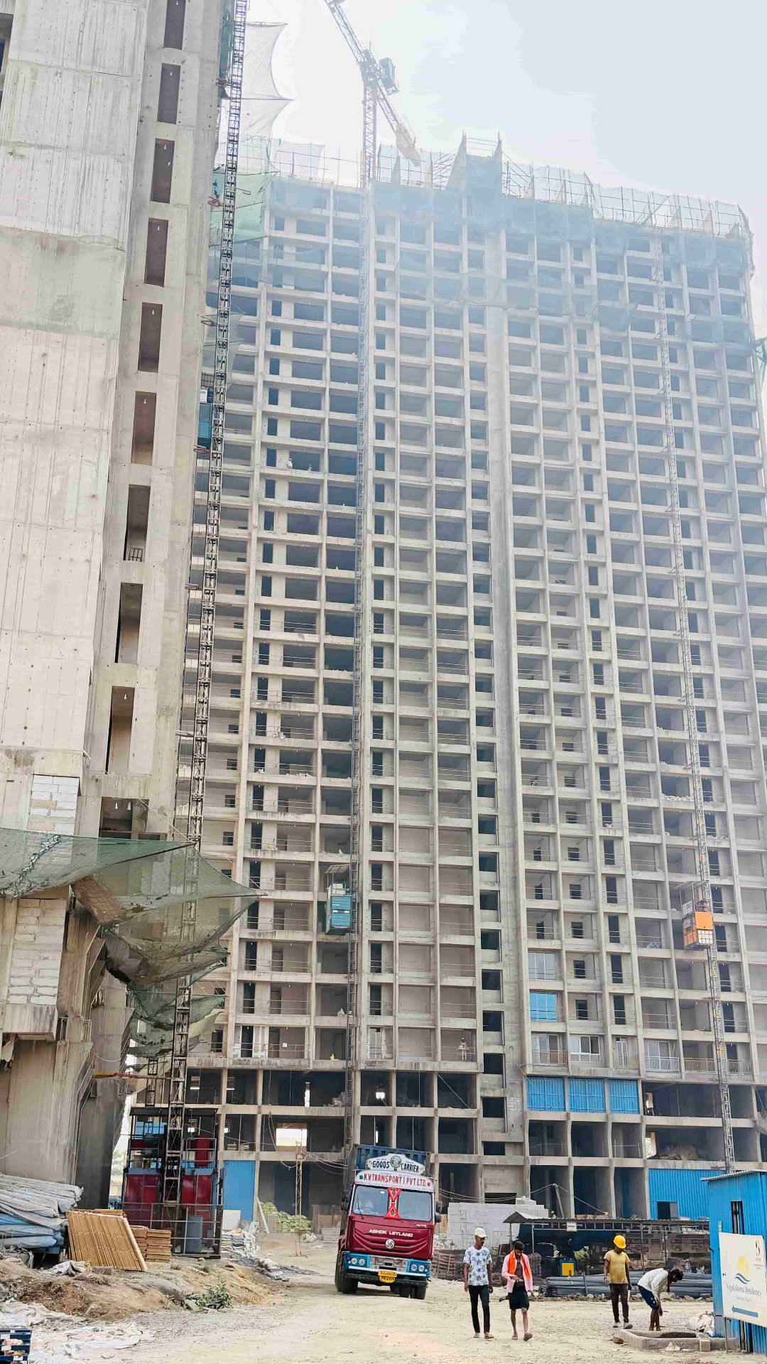 Outside view of Yogakshema Residency building under construction in Raigad, Panvel