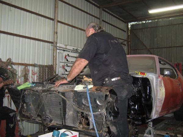 body shop working on classic car restoration