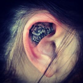 tattoo on ear