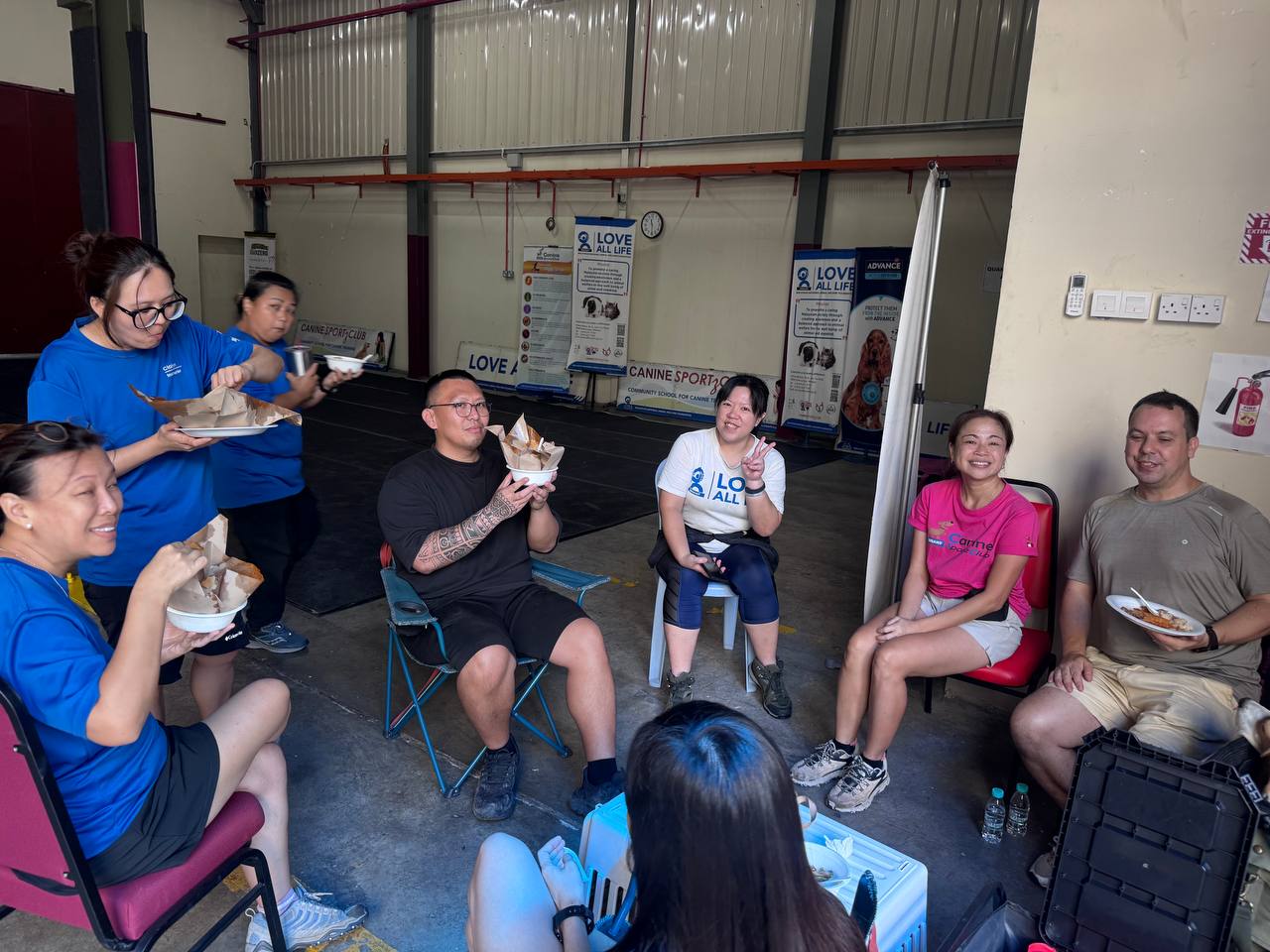 Post-graduation potluck with students and trainers