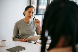 Therapist listening closely to a client