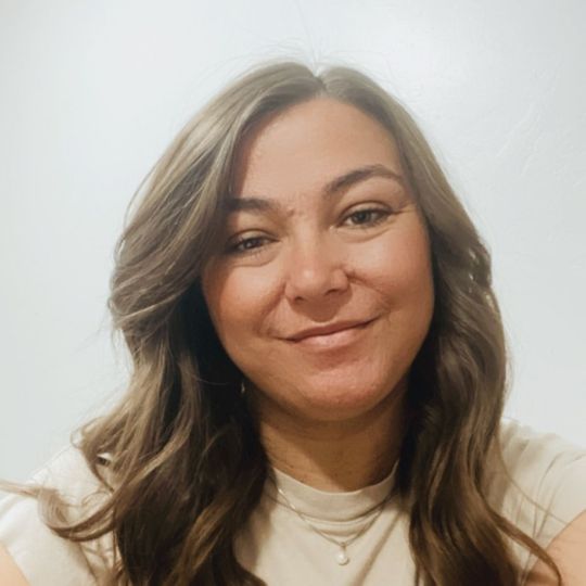 Keshia T, Coach Manager and Coach at Coaching Academics, smiling, white background
