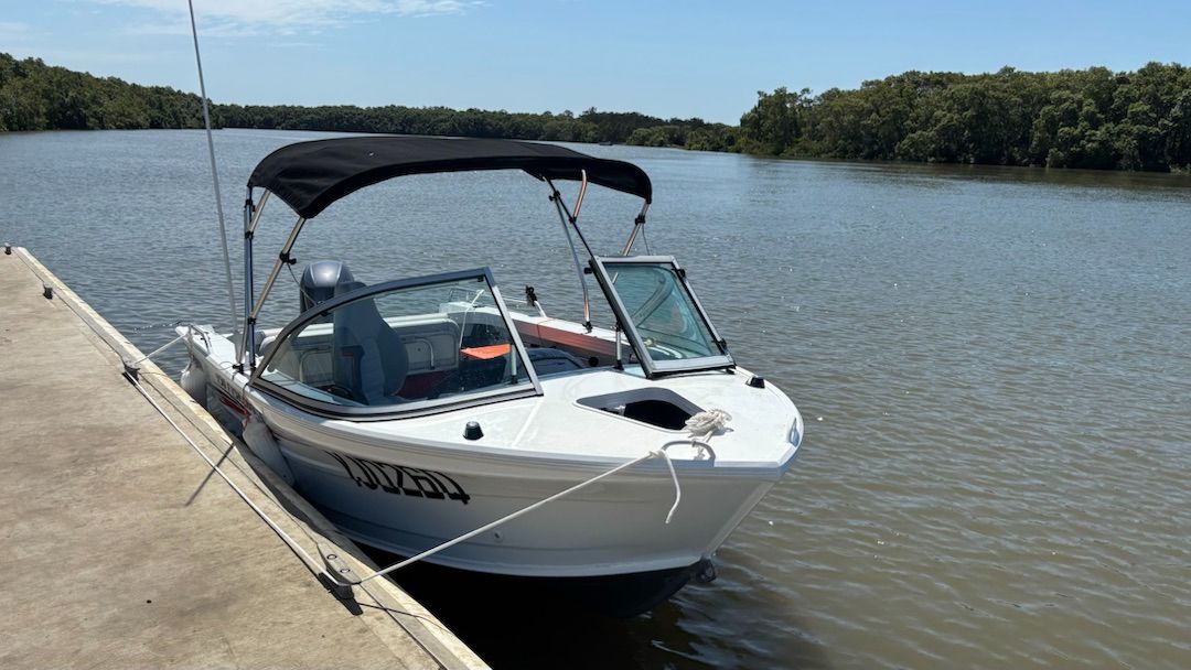 Quintrex 430 Fishabout self-drive boat hire Brisbane — front view on trailer