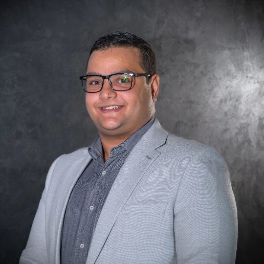 Technical Sales Team Leader at Reyada in a professional headshot with a confident smile