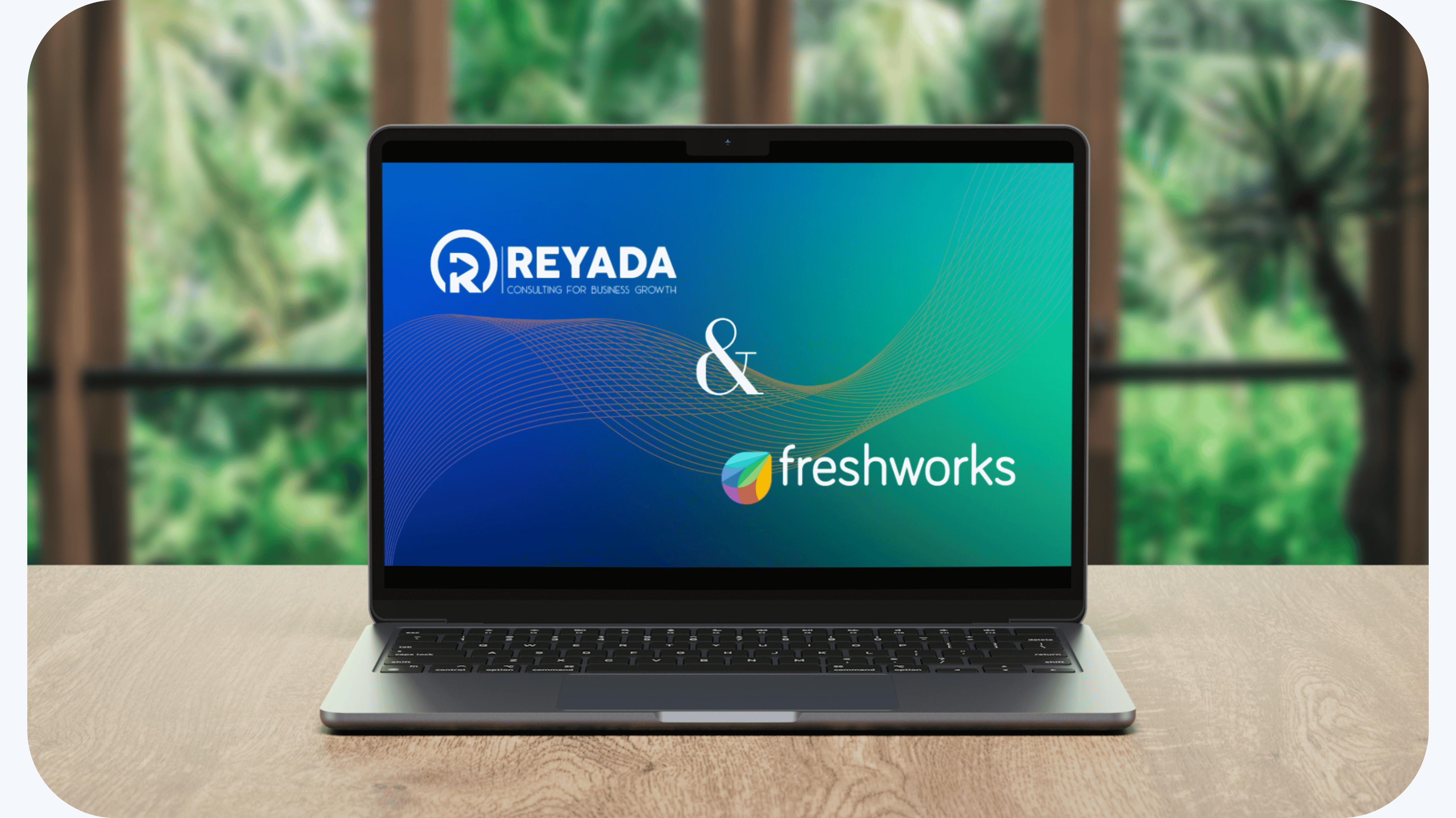 Laptop screen showcasing Reyada's strategic partnership with Freshworks as the Customer Service Suite solutions Provider